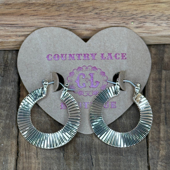 Gold ribbed hoop earring fashion 