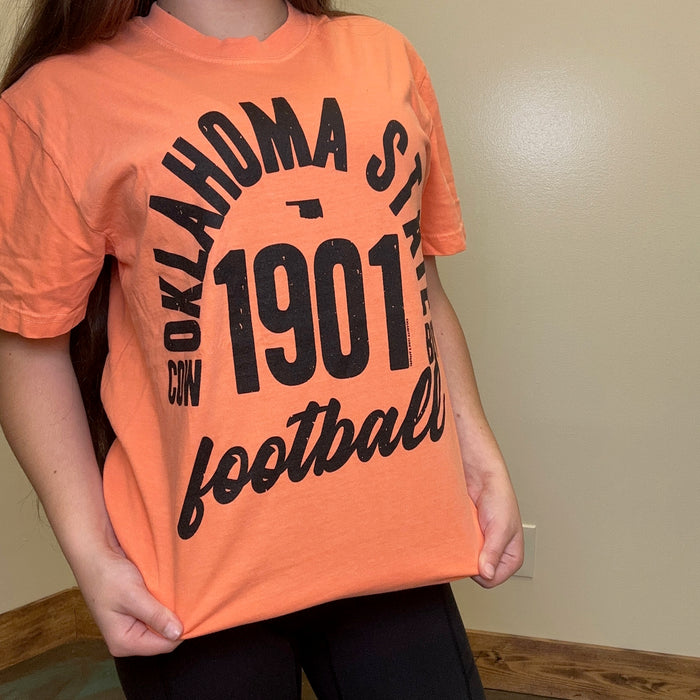 orange t-shirt with 'Oklahoma State 1901 football' 