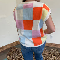 pink orange turquoise checkered sweater vest