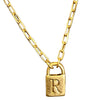 Gold chain with a clasp on a wooden surface