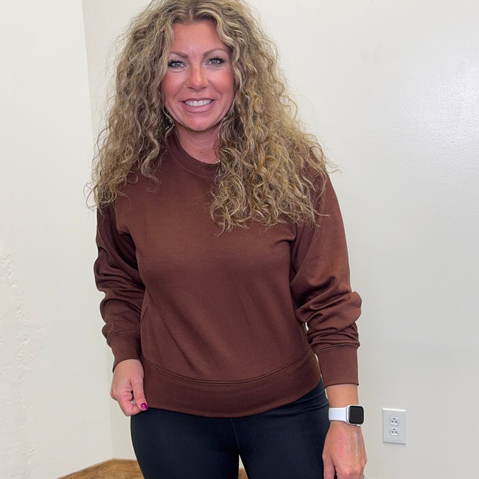 brown sweatshirt