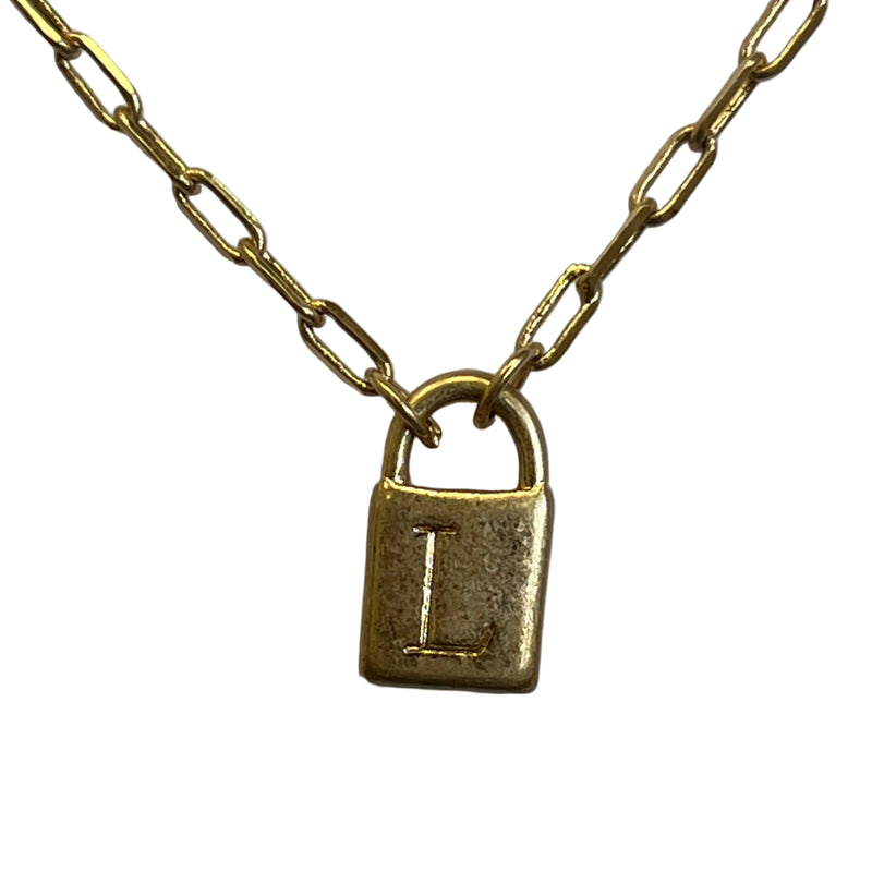 Gold chain with a lock-shaped pendant on a light gray background
