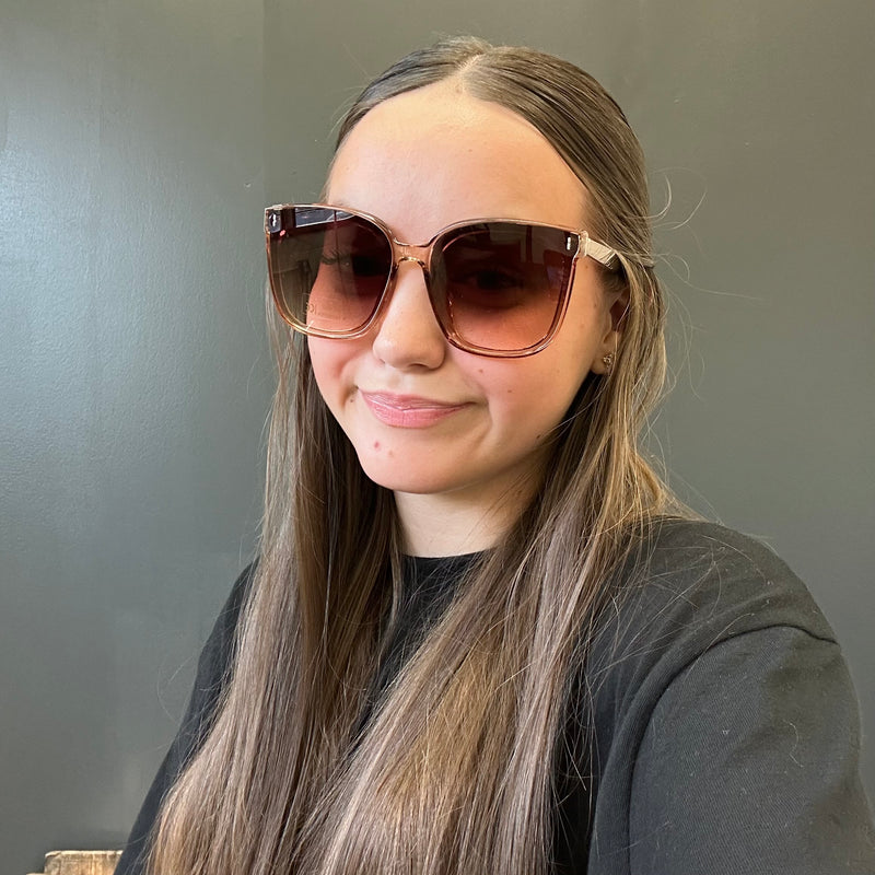 Person wearing large sunglasses 