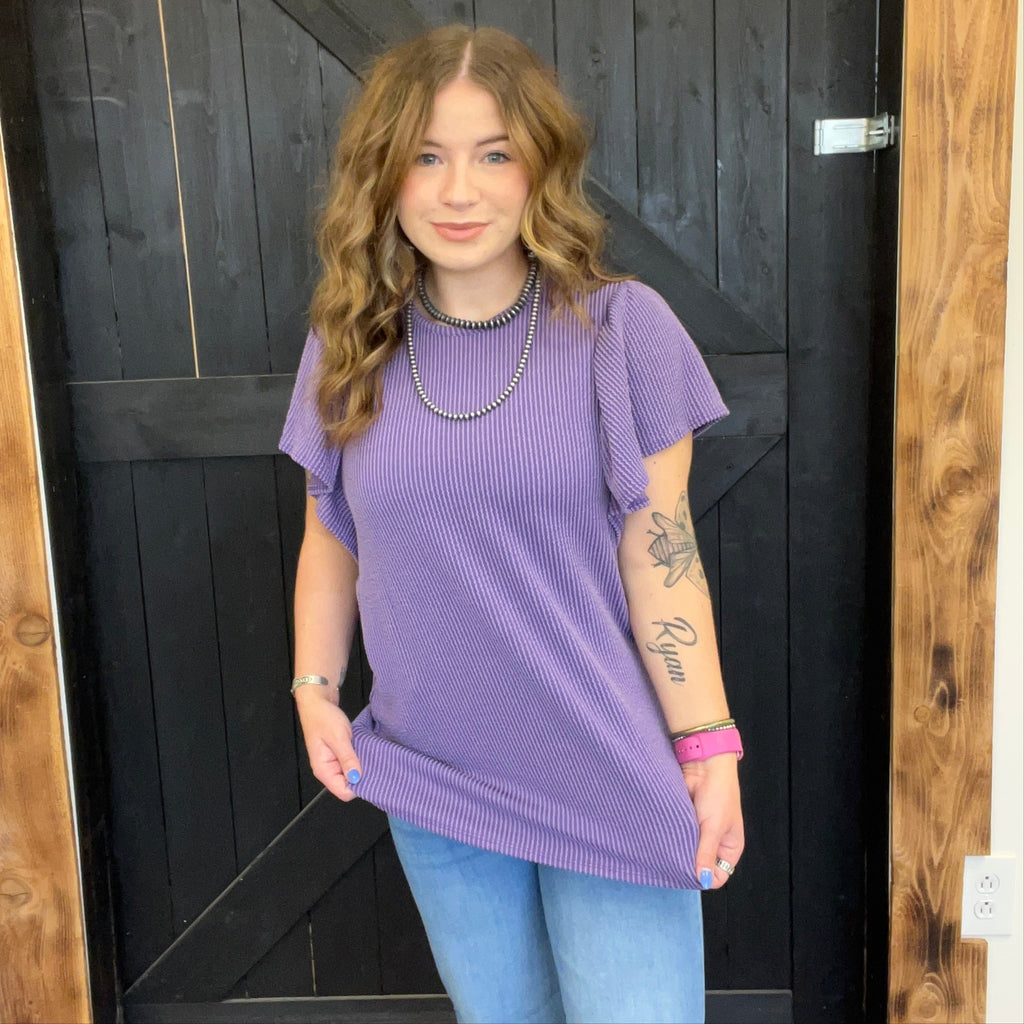 purple shirt ribbed ruffle sleeves