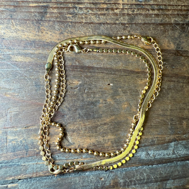 Triple Patterned Gold Fashion Bracelet