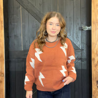 rust orange lightening bolt sweater