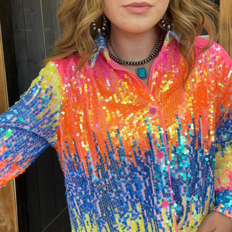 colorful sequin jacket with a pattern of blue, yellow, and orange.