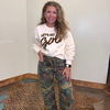 white sweatshirt with 'Let's Go Girl' text and camouflage pants 