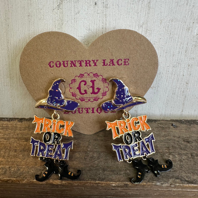Witch hat earrings with 'Trick or Treat' text on a Country Lace branded card.