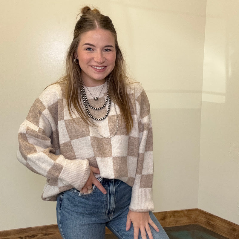 tan checkered sweater