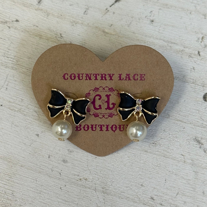 earrings with black bows and pearls 