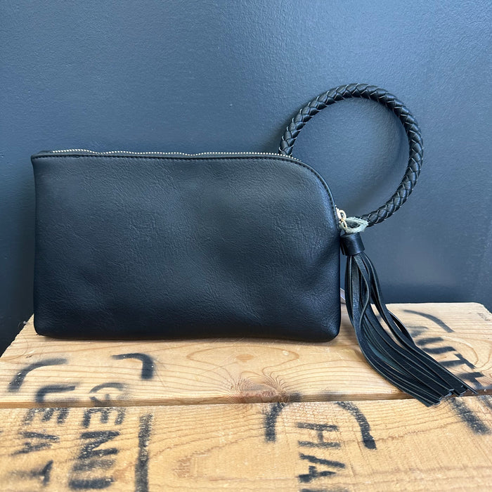 Black leather clutch bag with a braided handle and tassel 