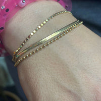 Triple Patterned Gold Fashion Bracelet.