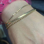 Triple Patterned Gold Fashion Bracelet.